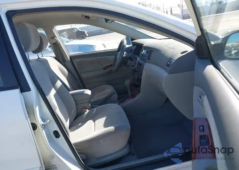 2003 Toyota Corolla Le z USA, uszkodzony, nr VIN JTDBR32E630013221